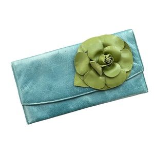 Turquoise leather flower clutch